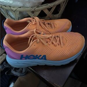 Hoka Vibrant Orange and Purple Sneakers